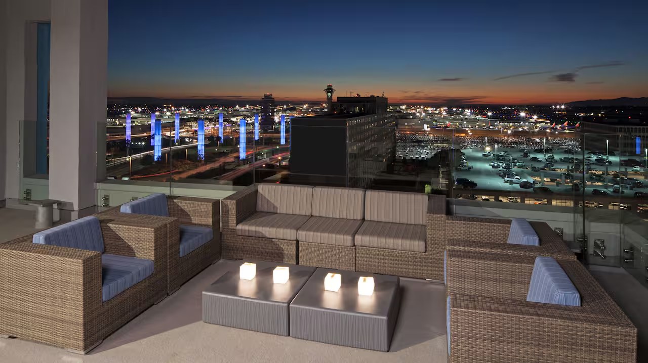Rooftop terrace outdoor lounge furniture at H Hotel Los Angeles